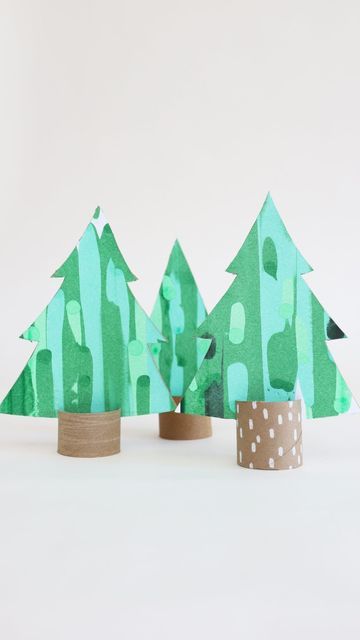 Kathryn on Instagram: "Scrape paint Christmas trees! Gave my cardboard roll trees a Christmas upgrade for #averycardboardchristmas TREE week. My squeegee broke on the first tree so sorry but you got a weird video 😂. You’ve still got a little Time to get your entries in before Vicki picks her top 8 🎄📦 @4plusmama #wearecardboardfolk #christmascraft #christmascrafts #recycleandplay #recyclemeplay #cardboardcrafts #recycledcrafts #cardboardart #cardboardcreations #cardboardtoys #diychristmasdecor #diychristmas #diychrostmasdecorations #christmasactivitiesforkids #christmasactivities #kidscraft #kidscrafts #kidscraft101 #cardboardboxcreative #diycardboardplay #cardboardchristmas" Christmas Diy Paper Roll, Cardboard Trees Diy, Card Board Christmas Trees, Cardboard Christmas Tree Craft, Cardboard Christmas Crafts For Kids, Paper Trees Christmas, Diy Cardboard Christmas Tree, Christmas Tree Cardboard, Cardboard Trees