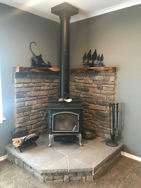 Corner wood stove fireplace with juniper mantel Wood Stove Decor, Wood Burning Stove Corner, Corner Wood Stove, Wood Stove Surround, Woodburning Stove Fireplace, Corner Stove, Stove Decor, Wood Stove Hearth, Wood Stove Wall