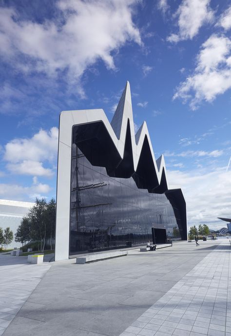 The Riverside Museum, an addition to the Glasgow Museum of Transport in Scotland, cuts a striking figure with its zigzagging zinc-clad roof. See more modern architecture designed by Zaha Hadid. London Aquatics Centre, Zaha Hadid Buildings, Riverside Museum, Zaha Hadid Architecture, Glasgow Museum, Modern Architecture Design, Famous Architecture, Rem Koolhaas, Zaha Hadid Architects