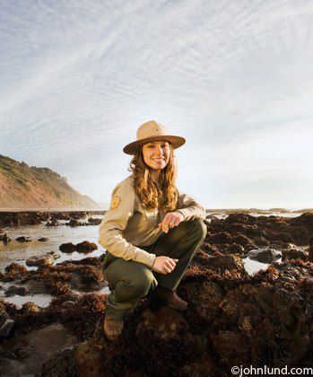 Picture of a mixed race female park ranger at the beach kneeling down next to some tide pools. Female Park Ranger, Park Ranger Aesthetic Outfit, Park Ranger Outfit, Ranger Uniform, Park Ranger Aesthetic, Ranger Aesthetic, Business Editorial, National Park Ranger, Job Inspiration