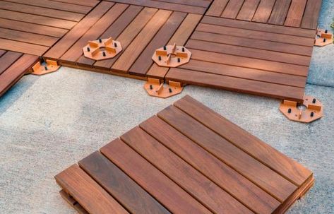 Transform a Concrete Patio Concrete Yard Makeover, Decking Over Concrete Patio, Decking Tiles Over Concrete, Wood Deck Over Concrete Patio, Outdoor Tiles Over Concrete, Deck Over Concrete Patio, Outdoor Tile Over Concrete, Flooring Over Concrete, Stone Decking