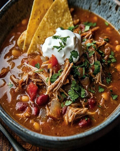 Enjoy a rich and flavorful Smoked Pulled Pork Chili with tender pulled pork, bold spices, and hearty beans. Perfect Soup With Pulled Pork Crock Pot, Chili Made With Pork, Pulled Pork Chilli Recipes, Smoked Pulled Pork Chili, Soup With Pulled Pork, Smoked Pork Chili, Pulled Pork Chilli, Pulled Pork Soup, Pulled Pork Chili Recipe