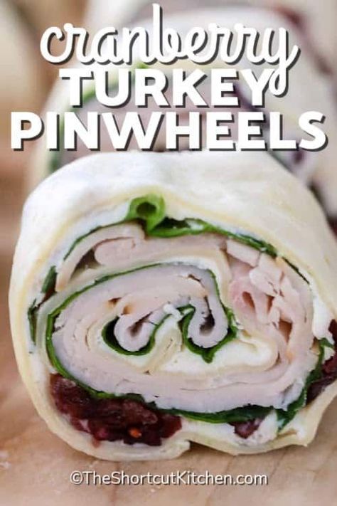 Delicious cranberry turkey pinwheels are anything but boring! It is so easy to roll up the flavor with these simple turkey roll ups. Cranberries, cream cheese, mayo, turkey breast, and spinach are the winning combination for this appetizer or even lunch option. Add a little more zing by including some bacon, ranch dressing, or extra cheese. #turkeypinwheels #turkeyrollups #turkeypinwheelsrecipe #theshortcutkitchen Cranberry Roll Ups Cream Cheeses, Costco Turkey Roll Ups, Turkey Cream Cheese Cranberry Roll Ups, Cranberry Spinach Pinwheels, Turkey Cream Cheese Roll Ups, Turkey Rollups With Cream Cheese, Turkey Pinwheel Appetizers, Turkey Cranberry Pinwheels, Pinwheels With Cream Cheese