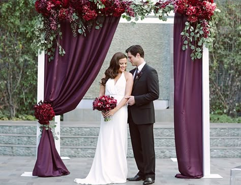 purple + glam wedding ceremony altar // eucalyptus, hydrangeas, dahlias, roses, orchids, grapes Maroon Wedding Backdrop, Nutcracker Wedding, Alter Design, Modern Glam Wedding, Dark Purple Wedding, Berry Tones, Cornwall Wedding, Berry Wedding, Funnel Cakes