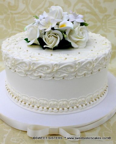 Ivory on White..elegant bridal flowers and piping over our smooth and light all butter cream icing #bridalshowers #ivoryandwhitecakes #sweetsisterscakesnj #pinparty #njweddings #njbride Wedding Cake White Piping, Vintage Piping Wedding Cake, Simple White Wedding Cake Pearls, Wedding Cake Intricate Piping, Butter Cream Icing, Cream Icing, 30th Wedding Anniversary, Shower Desserts, Pinterest Party