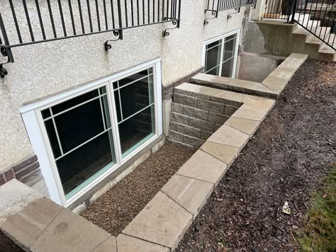 Landscaping Around Egress Window, Egress Window Ideas, Fence Around Egress Window, Large Egress Window, Adding Egress Window To Basement, Egress Window Landscaping, Double Casement Windows, Installing Egress Window, Landscaping Blocks