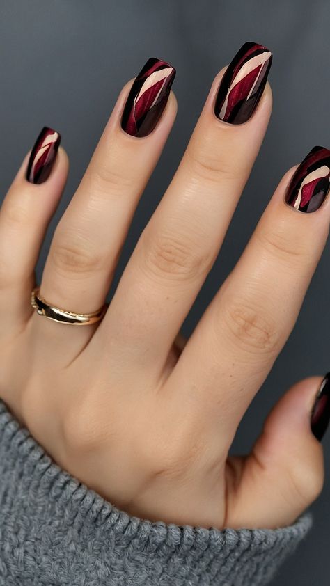 Get ready to embrace the season with stunning red fall nails that are perfect for any occasion Our latest blog post explores a variety of dark reds and vibrant shades offering design ideas that will make your nails stand out Discover creative acrylic designs featuring short nail art that combines red with striking black accents Whether you're looking for elegant inspirations or bold statements we've got you covered with color combinations that capture the essence of fall Tran Maroon Nails With Black Tips, Black With Red Chrome Nails, Red And Black Fall Nails, Vamp Red Nails, Black And Maroon Nail Designs, Black Nails With One Accent Nail, Burgundy Gel Nails Short, Black Nails With Red Chrome, Black Red Nails Ideas