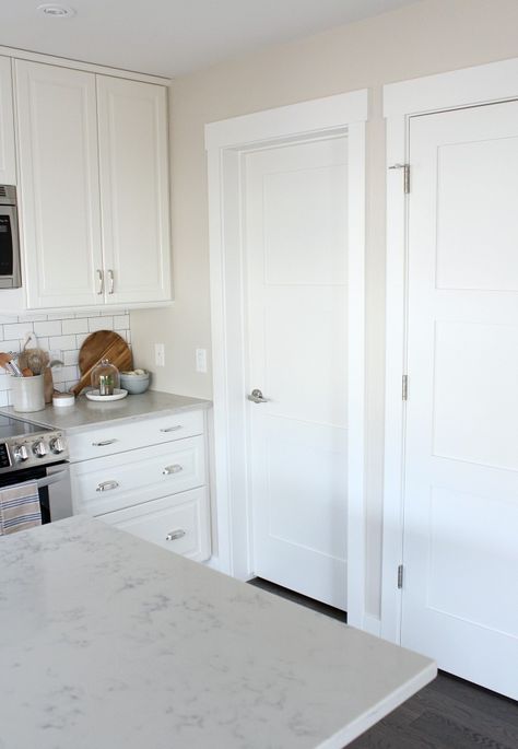 Kitchen with White Painted Shaker Style Trim and Doors - Satori Design for Living Doors– 3 Panel Harvest Door and Window Trim– Flat Stock MDF (Baseboard 1/2 x 5″; Casing sides and bottom 5/8 x 3″; Casing top 3/4 x 4 9/16″) Transitional Door Trim, Square Door Trim, Mdf Door Trim, Flat Stock Baseboard, Shaker Trim Moldings, Square Trim Around Doors, Flat Stock Window Trim, Flat Stock Trim, Square Baseboard Trim