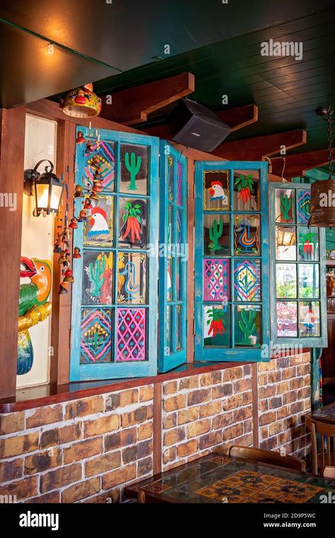 Mexican Windows Decor, Mexican Library, Mexican Decor Living Room, Mexican Style Restaurant, Mexican Windows, Mexican Doors, Cottage Patio, Painted Windows, Earth House