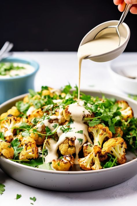 Lebanese Roasted Cauliflower with Tahini Sauce - Cooking Mediterranean Cauliflower With Tahini Sauce, Roasted Cauliflower With Tahini, Cauliflower With Tahini, Cauliflower Dishes, Cauliflower Steaks, Baked Cauliflower, Tahini Sauce, Lebanese Recipes, Yogurt Sauce