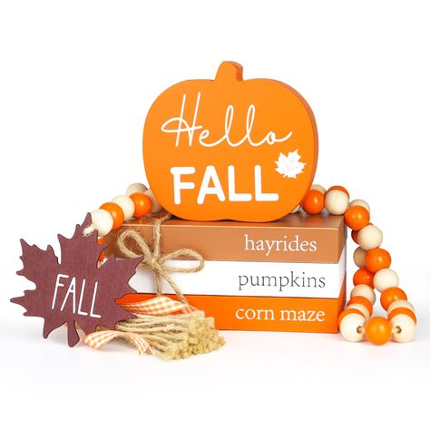 PRICES MAY VARY. 🎃 Charming Fall Décor Set: This fall wood book stack set includes a brown pumpkin, three mini faux wood books, and a wood bead garland. It's a perfect addition to your Thanksgiving decor, adding a touch of autumn charm to any space. 🎃 Perfect Size: The stacked books measure 5.5 x 3.5 x 2.4 inches, the pumpkin sign is 4.0 x 3.7 x 0.8 inches, and the bead garland is 35.6 inches long. The wooden books are printed with "corn maze" "hayrides" and "pumpkins," while the pumpkin featu Fall Bead Garland, Wood Book Stacks, Fall Table Decorations, Wood Books, Fall Tiered Tray Decor, Stacked Books, Fall Bead, Pumpkin Ornament, Pumpkin Sign