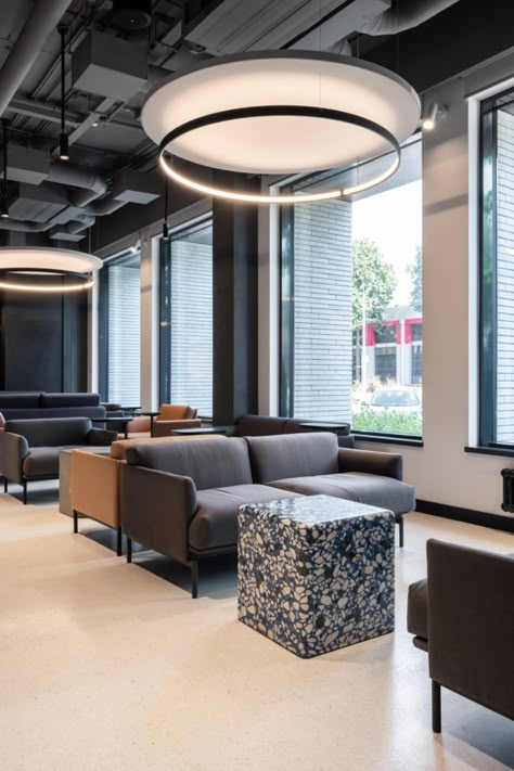 PRIDEX Multispace Spec Suite - Moscow | Office Snapshots Office Ceiling Light Design, Traditional Reception Desk, Lounge Lamps, Office Lighting Design, Office Ceiling, Open Ceiling, Lounge Lighting, Modular Lounges, Lobby Design