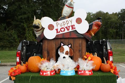 Our 2018 trunk - "Puppy Love" with dog balloons, "dog house" created from foam core and handpainted, dog bowls with puppy-themed candy and stickers. Dog Pound Trunk Or Treat, Puppy Trunk Or Treat Ideas, Dog Trunk Or Treat Ideas For Cars, Animal Themed Trunk Or Treat, Dog Themed Trunk Or Treat Ideas, Dog Themed Parade Float, Trunk Or Treat Ideas For Cars With Dogs, Dog House Trunk Or Treat, Trunk Or Treat Animal Theme