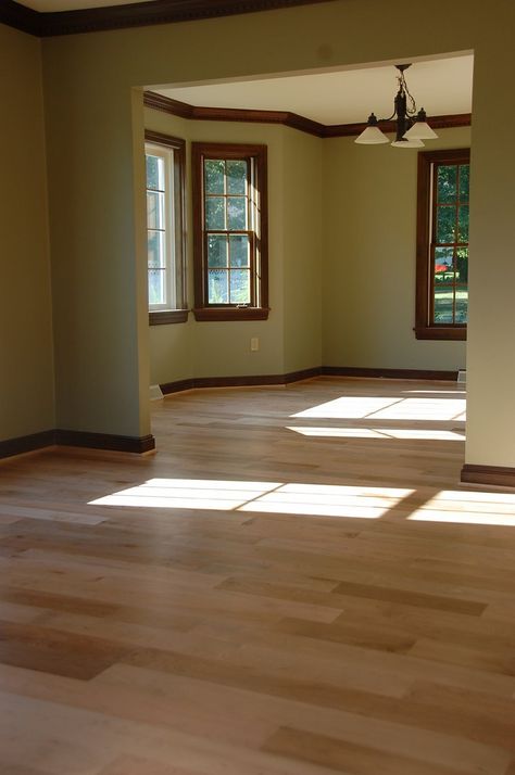 Contrasting Appalachian Maple with Dark Trim makes a dramatic effect.  The light hues of maple give alternative look to the classic brown tones of Oak flooring. Light Floor With Dark Trim, Light Floors With Dark Trim, Light Wood Floors With Dark Trim, Light Wood Floors Dark Trim, Dark Wood To Light Wood Transition, Dark Trim With Light Wood Floors, Light Hardwood Floors With Dark Trim, Dark Trim Light Floors, Flooring With Dark Trim