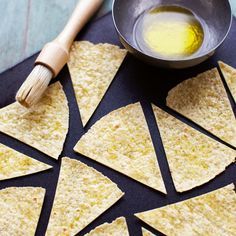 Why buy heavily processed tortilla chips when you can make your own at home in a jiffy from a humble pack of corn tortillas? Home Made Nachos, Delicious Magazine Recipes, Tortilla Chips Recipe, Beach Recipes, Tortilla Chip Recipe, Healthy Food Alternatives, Homemade Tortilla Chips, Homemade Chips, Healthier Options