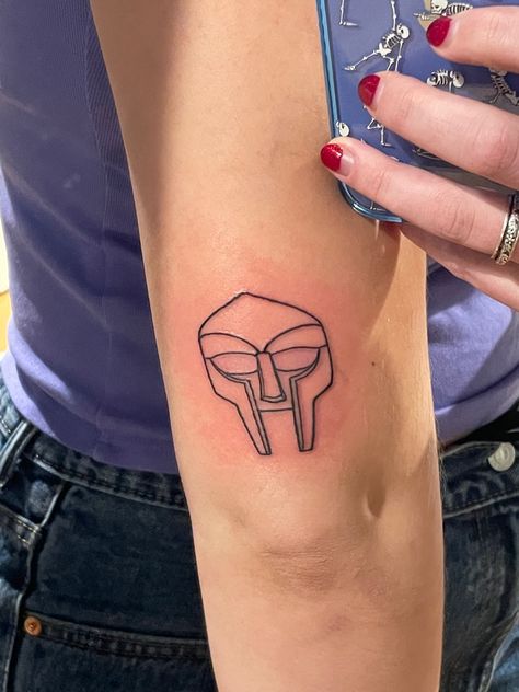 Hip Hop Inspired Tattoos, Wolf Tyler The Creator Tattoo, Mf Doom Tattoo Ideas, Mf Doom Mask Tattoo, Mbdtf Tattoo, Tyler The Creator Inspired Tattoos, Tyler The Creator Tattoos Ideas, Rap Tattoo Ideas, Igor Tattoo