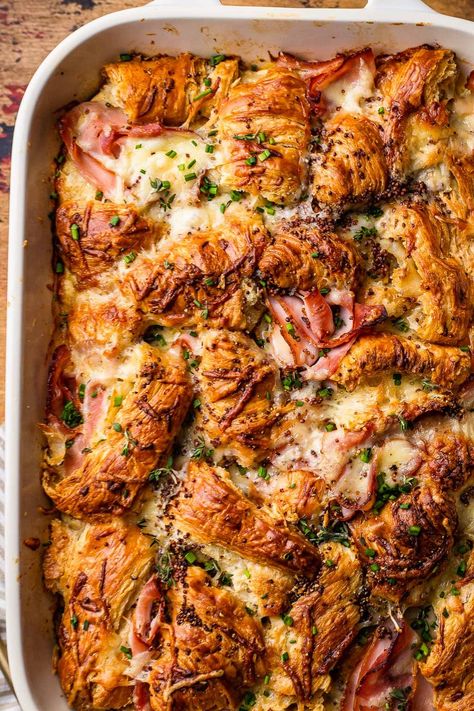 This Ham and Cheese Croissant Bake is the perfect holiday breakfast. Croissants, ham, gruyere, and custardy eggs layered together and baked. Breakfast Croissants, Croissant Bake, Croissant Breakfast Casserole, Ham Breakfast Casserole, Weeknight Dinner Recipes, Ham And Cheese Croissant, So Much Food, Ham Breakfast, Cheese Croissant