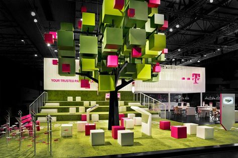 T Mobile's exhibition stand features a pixelated tree and its pixelated leaves as seats Mobile Exhibition, Expo Stand, Trade Show Design, Mobile Logo, Garden Lounge, Exhibition Stall, Exhibition Stands, Stall Designs, Design Salon