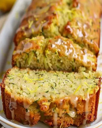 Easy Lemon Zucchini Bread Recipe - Moist and Delicious Lemon Zucchini Bread Recipe, Lemon Bread Recipes, Zucchini Recipes Dessert, Lemon Zucchini Bread, Easy Zucchini Bread, Lemon Zucchini, Zucchini Bread Recipe, Lemon Bread, Lemon Dessert Recipes