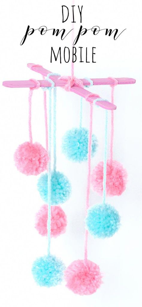 Make a pretty mini pom pom mobile out of wool and lolly sticks. This craft would look lovely hanging in the nursery/baby's room, or create it with colourful wool to make some funky home decor! #mobiles Lolly Stick Crafts, Lolly Stick Craft, Crafts Pom Poms, Craft Ideas For The Home, Pom Pom Mobile, Wool Crafts Diy, Mobile Craft, Diy Baby Mobile, Mini Pom