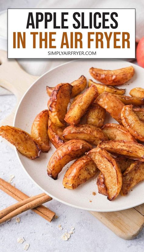 cooked and slightly crispy apple slices on white plate with text overlay "apple slices in the air fryer". Baked Apple Slices, Apple Slice Recipe, Air Fryer Recipes Dessert, Air Fryer Oven Recipes, Air Fry Recipes, Fried Apples, Yogurt And Granola, Slice Of Heaven, Cooked Apples