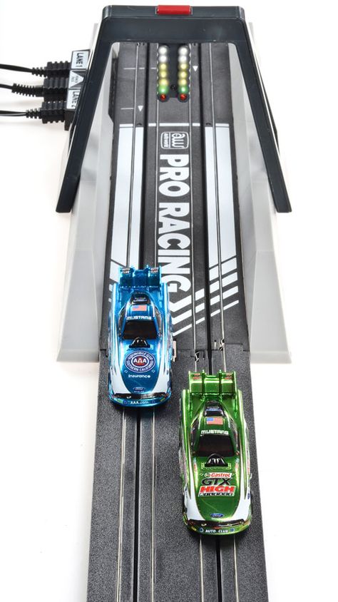 [GIFT IDEA] JEGS Auto World Slot Car Drag Racing Track Sets    Features:  - Fully Functional LED Christmas Tree  - Compatible with most HO Scale Slot Cars  - Electronic Finish Line with WIN Lights  - In-Track Sensors for Red Foul Light  - Cars Safely Stop at End of Track  - Pro & Sportsman Racing Modes  - Variable-Speed Controllers  - 13 Feet of Race Track Slot Car Drag Racing, Yummy Cake Recipes, Beyond Frosting, Scalextric Track, Salford City, Racing Track, Ho Slot Cars, Slot Machine Cake, Slot Machine Party