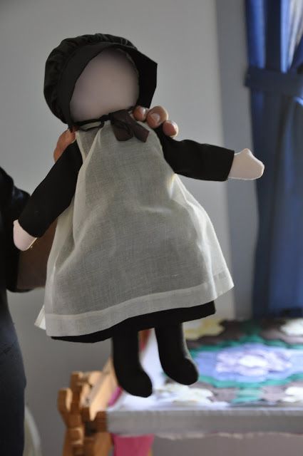 Amish Hand made doll held over top of a quilting frame ~ Sarah's Country Kitchen ~ More Amish Doll Pattern Free, Sewing Doll Blankets, Quilted Doll Blanket, Doll Bedding Pattern, Amish Dolls, Hand Made Doll, Anne Hand Made Dolls, Amish Crafts, Amish Quilt