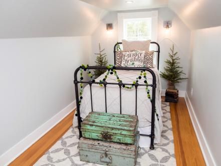 With just a single bed and spare furnishings, the room converts nicely into a cozy hideaway bedroom. Magnolia Bed And Breakfast, Magnolia Bed, Fixer Upper Christmas, Magnolia Style, Breakfast Christmas, Magnolia Fixer Upper, Magnolia House, Finished Attic, Farmhouse Style Bedrooms