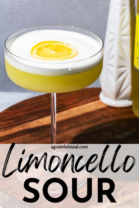 This limoncello sour cocktail recipe is one of the best Italian drinks and the perfect combination of sweet and sour. Made with limoncello, lemon juice, and egg whites, this refreshing and light cocktail will be your new favorite lemon cocktail. It is similar to a limoncello martini and the best cocktail recipe that everyone will love! Egg White Drink Recipe, Caravella Limoncello Drinks, Drinks With Limoncello, Lemon Cello Drinks, Lemonchello Drinks Cocktails, Lemoncello Recipes Drinks, Lemon Juice Cocktail, Yellow Cocktails, Yellow Drinks