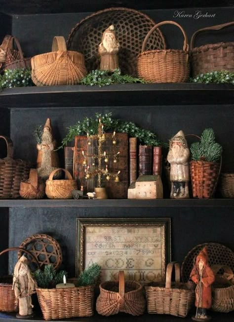 Basket Collection Display, Decorating Bookcases For Christmas, Antique Booth Shelving Ideas, Wicker Shelf Styling, Fall Antique Booth Displays, Primative Decor Country, Christmas Bookcase Decor, Fall Hutch Decor Ideas, Christmas Hutch Decorating Ideas