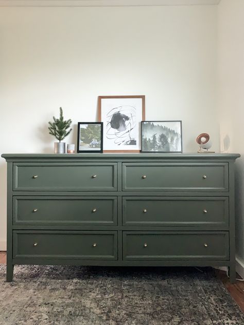 Updated dresser in muted olive with brass hardware. #diyhomedecor #diyproject #diyideas #kidsbedroomideas #dresserdecor #dresser #boysroomdecor #boysroomideas #bedroomdecorideas #bedroominspo Painted Dresser In Nursery, Ikea Dresser Green, Bedroom Dresser Drawers, Green Dressers Bedroom, Diy Bedroom Dresser Ideas, Bedroom With Green Dresser, Bedroom Green Dresser, Colored Dressers Bedroom, Green Dresser Gold Hardware