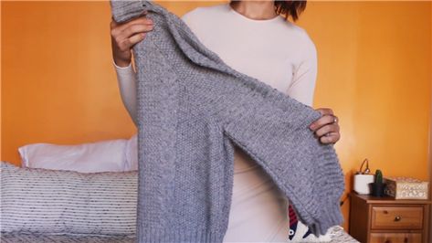 Try%20this%20sweater-hanging%20method%20that%20won't%20ruin%20your%20go-to%20cozy%20cable-knit. Fold A Sweater, Fold Sweaters, How To Fold Sweaters, Sweater Hangers, Hang Sweaters, Sweater Hanging, Bulky Sweaters, Plain Sweaters, Why Read