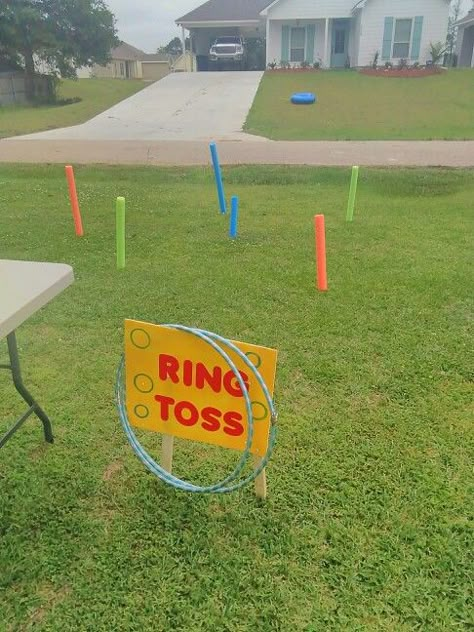 Ring toss carnival game we made out of pool noodles and hula hoops. We stuck the noodles down in the ground with small wooden dowels. Ring Toss Carnival Game, Mini Olympics, Carnival Event, Fall Festival Games, Softball Party, Church Picnic, Fall Carnival, Diy Carnival, Carnival Ideas