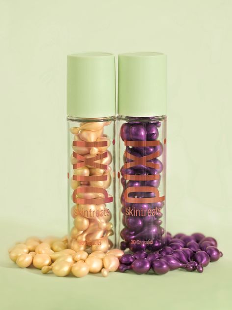 Photo of NEW Vitamin-C and Retinol CapsuleCare with capsules surrounding the base of both bottles. Photo taken with product in front of Pixi Green background. Pixi Skintreats, Makeup And Skincare Products, High Pigment Eyeshadow, Glow Tonic, Pixi Beauty, Skin Care Quiz, Pigment Eyeshadow, Makeup And Skincare, Best Skincare Products