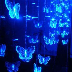 Hanging butterflies. In The Dark, Butterflies, Led, Blue