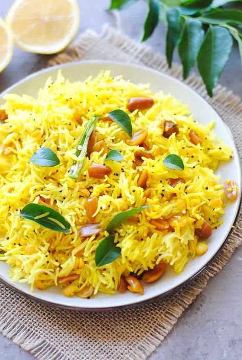 Indian lemon rice pilaf in the instant pot is an easy, 25 minute recipe. Made with simple and healthy ingredients like Basmati rice, turmeric, lemon juice and peanuts, this is a vegan and gluten-free one-pot meal! #lemonrice #instantpotrice #onepotmeal #quickandeasymeals #indianrecipes South Indian Lemon Rice Recipe, Rice Turmeric, Rice Recipes Indian, Quick Rice Recipes, Lemon Rice Recipe, Grains Recipes, Rice Dishes Easy, Quick Rice, Indian Rice Recipes