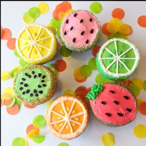 Fruit-themed cupcakes! Trophy Cupcakes in Seattle are delicious!    https://www.trophycupcakes.com/ Tutti Fruity Cupcakes, Fruit Inspired Cupcakes, Twotti Fruity Cupcake Ideas, Two Tii Fruit Birthday Theme, Twotti Fruity Birthday Cupcakes, Tutti Frutti Cupcakes, Fruit Birthday Cupcakes, Cupcake Fruit Decoration, Food Themed Cupcakes