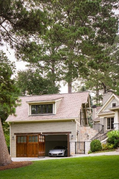 Carriage House: Inside an Atlanta Carriage Home Addition Brick Carriage House Garage, Garage Kitchenette, Carriage House Interior, English Cottage Farmhouse, Carriage House Apartments, Steel French Doors, Carriage House Garage, Carriage House Plans, Garage Addition