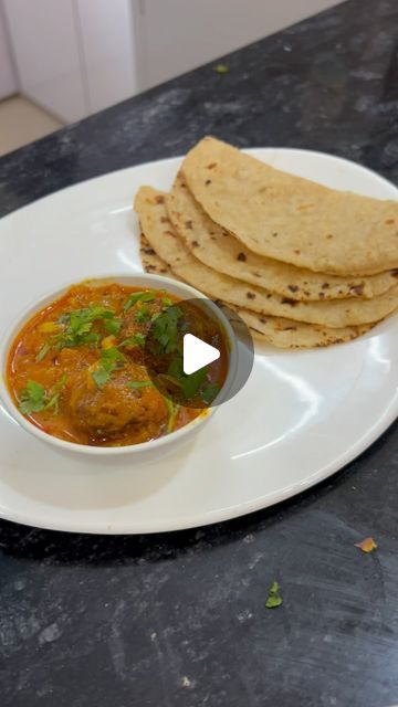 eatandeatttttt on Instagram: "Lauki kofta💗
Ingredients:
For  Making kofta
200 gms lauki, grated
Salt To Taste 
¼ tsp Turmeric Powder
½ tsp Ginger Garlic paste
2 tbsp Chana Dal, Soaked
2 tbsp Curd, thick 
¼ cup Gram Flour
1 tsp Soda
1 tbsp Oil
Oil For Shallow Fry

For Gravy 
 2 tbsp Oil
½ tsp Cumin Seeds
5-6 Garlic,
1 inch Ginger, 
2 Green Chilli,
2 Medium Onion, 
1 tomato puree
1/2 tsp aamchur powder 
1 tsp Coriander Powder
1 tsp Turmeric Powder
1 tsp Red Chilli Powder
⅓ cup Curd 
½ tsp Red Chilli Powder 
1 tsp Coriander Powder 
Garam masala
Salt To Taste 
1 tbsp Coriander leaves 
Process 
Making Lauki Kofta
● Peel the lauki & Grate it.
● Squeeze the grated lauki and collect the juice in a bowl or mug. 
● Mix all the ingredients for making the koftas with the grated lauki except oil.
● Ma Lauki Kofta, Ginger Garlic Paste, Chana Dal, Tomato Puree, Red Chilli Powder, Cumin Seeds, Gram Flour, Turmeric Powder, Coriander Powder