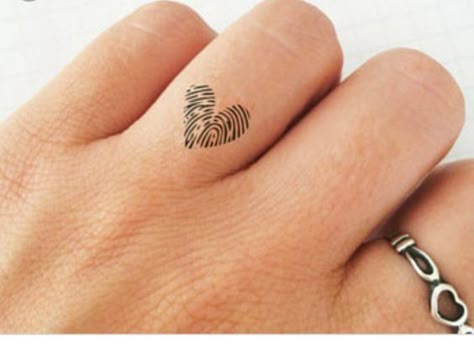 Top 24 Fingers Heart Tattoos To Must Try In 2024 Couple Tattoos Fingerprint, Finger Print Heart Tattoos, Thumb Print Heart Tattoo, Finger Tattoo Heart, Finger Print Tattoo Ideas, Healed Finger Tattoos, Finger Print Tattoo, Finger Tattoos Fade, Heart Locket Tattoo