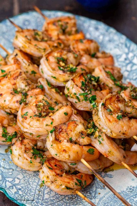 Grilled Shrimp Kabobs, Mediterranean-Style | The Mediterranean Dish Greek Shrimp Recipes, Fish Gyros, Shrimp Souvlaki, Greek Fish Recipe, Greek Seafood, Mediterranean Mezze, Grilled Shrimp Kabobs, Mediterranean Seafood, Shrimp Kabob Recipes