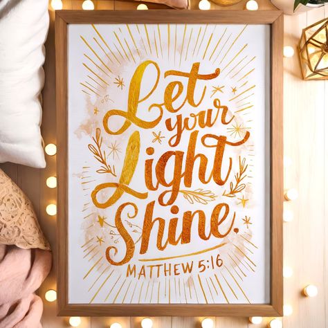 Illuminate your space with this inspiring "Let Your Light Shine" wall art, based on Matthew 5:16. The design features a radiant golden script surrounded by sunbeams and delicate foliage, perfect for bringing warmth and positivity to any room. Whether for home decor or as a thoughtful gift, this artwork serves as a beautiful reminder to shine your light and spread kindness. You Are The Light Of The World, Let Your Light Shine Door Decoration, Let It Shine Poster, Be The Light, Let Your Light Shine Handout, Arise Shine For Your Light Has Come, Be The Light Quote Bible, Let Your Light Shine Matthew 5:16, Shine Your Light