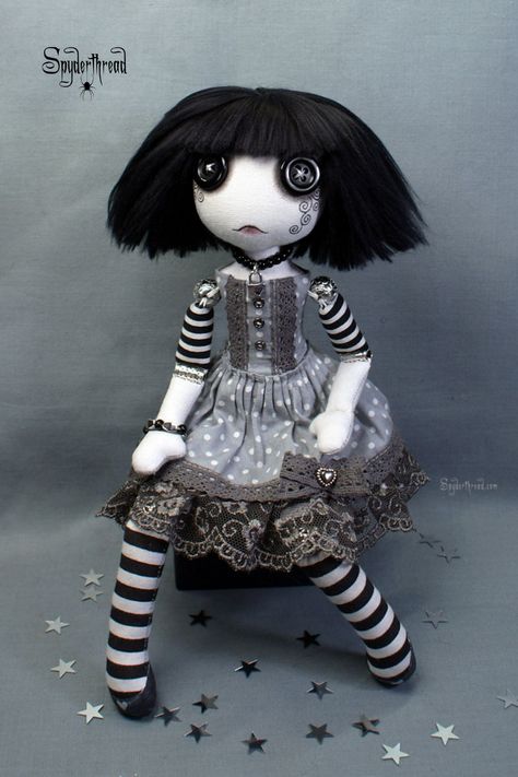 a gothic style, bead jointed, textile art doll, with button eyes and black hair, wearing a grey polka dot dress and striped stockings Cloth Art Dolls, Creepy Cute Art, Textile Art Dolls, Raggedy Doll, Cloth Art, Ugly Dolls, Art Dolls Cloth, Voodoo Dolls, Creepy Dolls