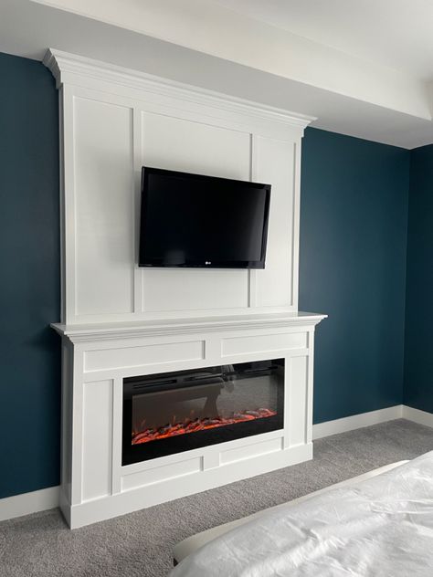 Electric Fireplace In Master Bed, Living Room With Fake Fireplace, Tv Wall Design Fake Fireplace, Box Molding Around Tv, Electric Fireplace With Board And Batten, Electric Fireplace Ideas With Tv And Mantle, Rectangle Electric Fireplace Ideas, Bump Out Fireplace, Bedroom Electric Fireplace Ideas Master