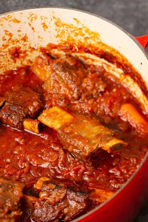 A pot of ribs and sauce Sunday Sauce Recipe, Sugo Sauce, Meaty Pasta, Sausage Meatballs Recipes, Italian Sauce Recipes, Cooking Short Ribs, Best Spaghetti Sauce, Sunday Gravy, Beef Ribs Recipe