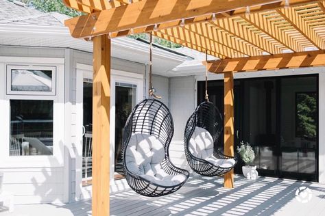 We removed the base from these allen + roth hanging chairs and placed them directly on our DIY pergola. Having this space attached to the house has been one of our best ideas. Simple and modern. We love having a swing on the back deck too. Having them covered with shade is a bonus! Download the LIKEtoKNOW.it shopping app to shop this pic via screenshot http://liketk.it/2FLbN #liketkit @liketoknow.it Hanging Chairs Backyard, Hanging Chairs Outside, Pergola Hanging Chair, Hanging Outdoor Chair, Swings On Pergola, Hanging Chairs Outside Patio, Patio Swings Ideas Hanging Chairs, Pergola With Hanging Chairs, Hanging Chair Outdoor Pergola