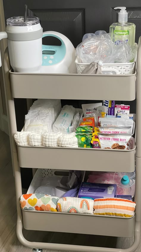 Jenn Muñoz | Third trimester and I’m in full nesting mode. 😁 Finished my breastfeeding/mommy cart to make those late nights and pumping sessions easier … | Instagram Bottle And Pumping Organization, Bedside Pumping Station, Breast Feeding Station Organization, Pumping Station Cart, Bedside Cart For Newborn, Post Partum Caddy, Pumping Cart Ideas, Nursing Cart Organization, Postpartum Cart Bedside