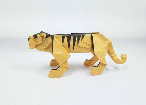 Tiger, designed and folded by Mathieu Gueros (source: ) #origami #tiger Origami Tiger, Origami Animals, Big Cat, Cat Stuff, Origami Crafts, By Myself, Simple Shapes, Big Cats, Origami