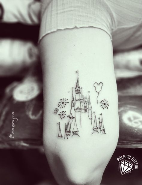 Disney Lover Tattoo, Simple Disney Castle Tattoo, Disney Fireworks Tattoo, Tale As Old As Time Tattoo, Disney World Castle Tattoo, Fairy Godmother Tattoo, Disney Tattoos For Women, Disney Fine Line Tattoo, Disney World Tattoo