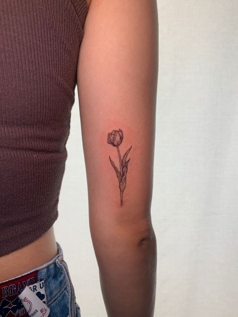 Arm Tattoos Minimal, Tulip Tattoo Back Of Arm, Flower Bud Tattoo, August Tattoo, Biology Tattoo, Tulip Tattoos, Carnation Tattoo, Wand Tattoo, Tiny Tattoos For Women